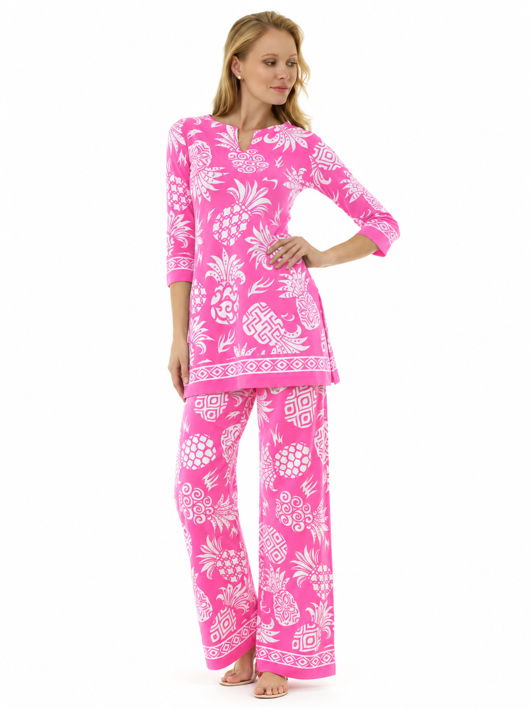 Woman wearing the Pink Pineapple knit tunic and matching palazzo pants, 2 piece set