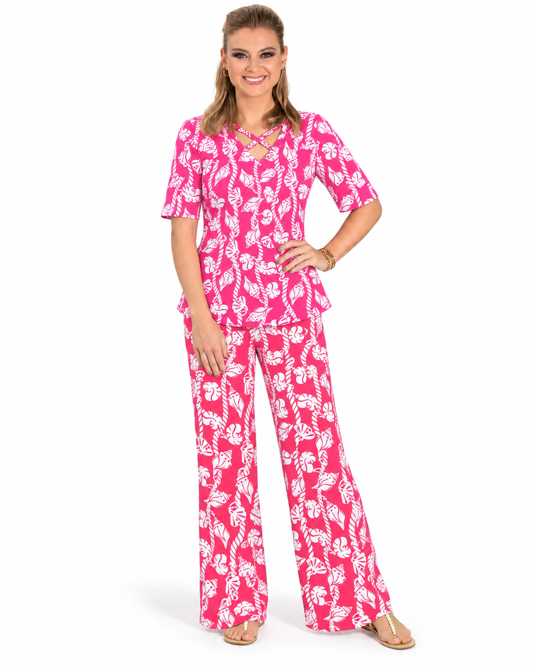 Woman wearing the Flamingo nylon reversible top and matching palazzo pants, 2 piece set