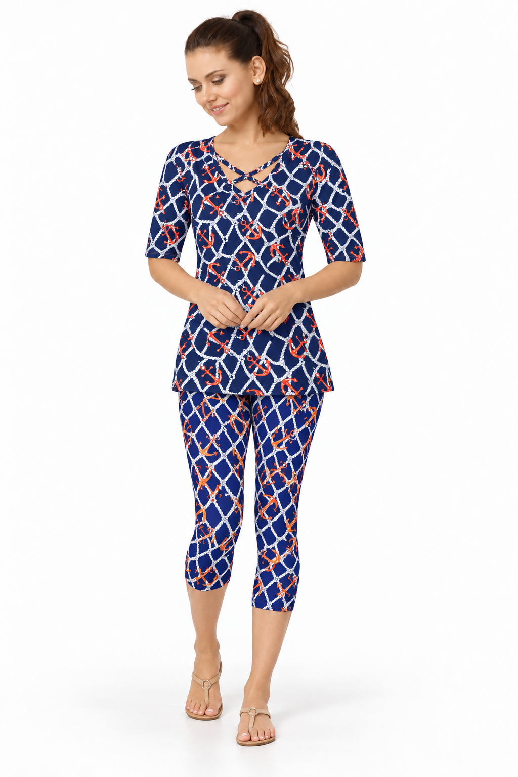 Woman wearing the Navy Orange nylon reversible top and matching capri, 2 piece set
