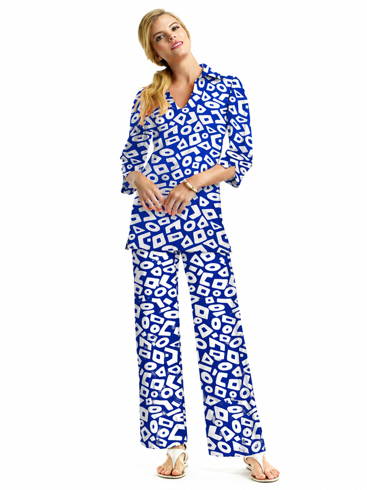 Woman wearing the Navy nylon shirt collar tunic and matching palazzo pants, 2 piece set
