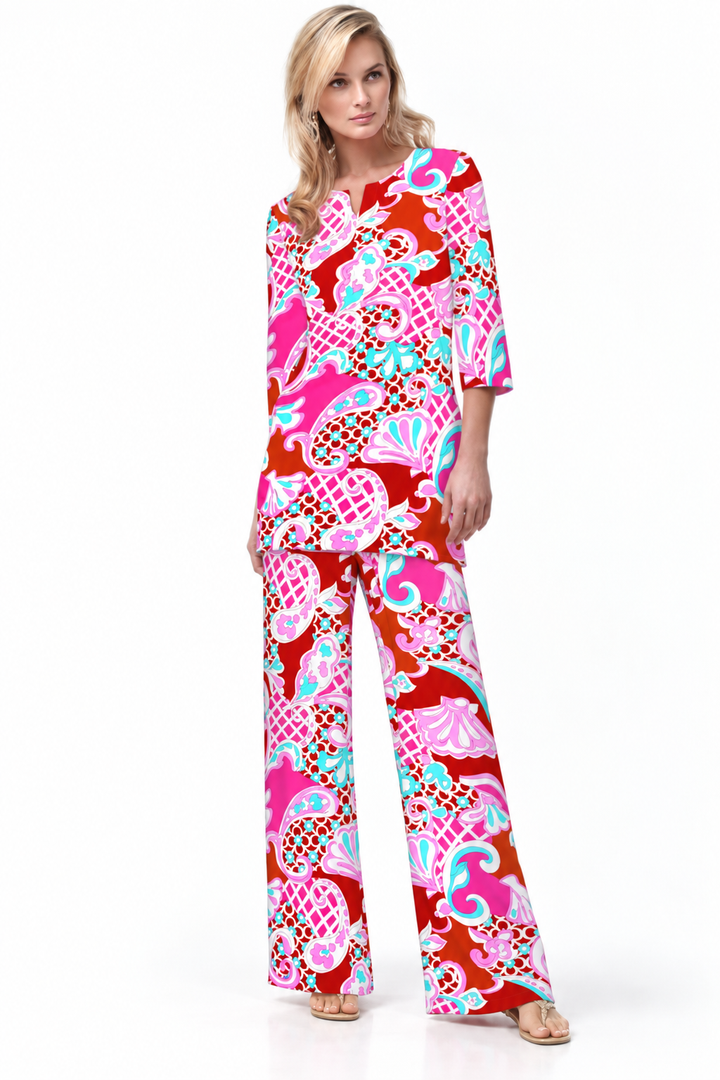Woman wearing the Poppy Pink nylon tunic and matching palazzo pants, 2 piece set