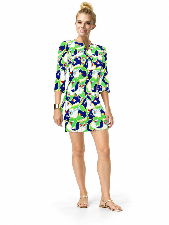 Woman wearing the Green Navy nylon tunic and matching skort, 2 piece set