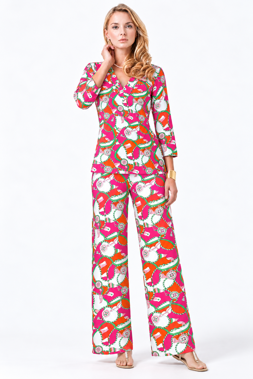 Woman wearing the Tangerine Pink nylon top and matching palazzo pants, 2 piece set