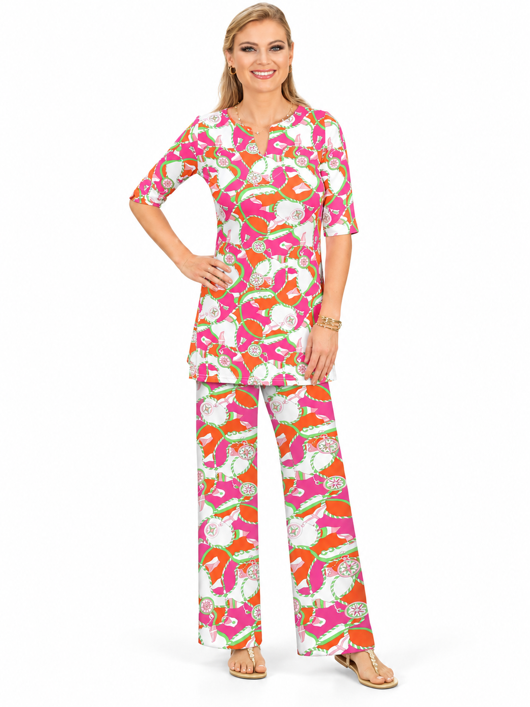 Woman wearing the Tangerine Pink nylon tunic and matching palazzo pants, 2 piece set