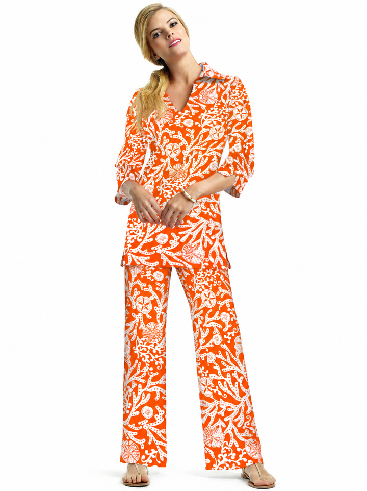 Woman wearing the Deep Orange nylon tunic and matching palazzo pants, 2 piece set