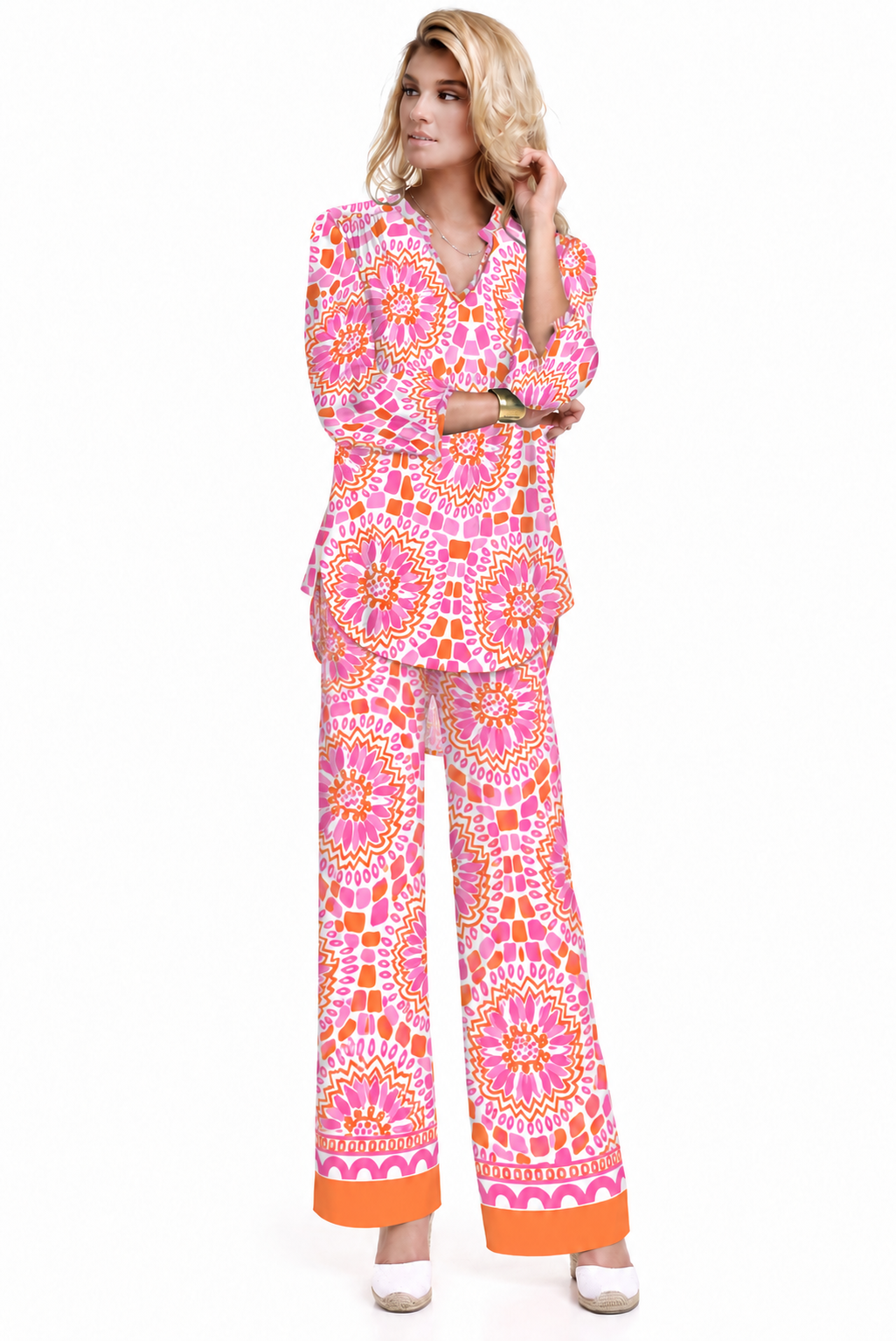 Woman wearing the Tangerine Pink rayon tunic and matching palazzo pants, 2 piece set