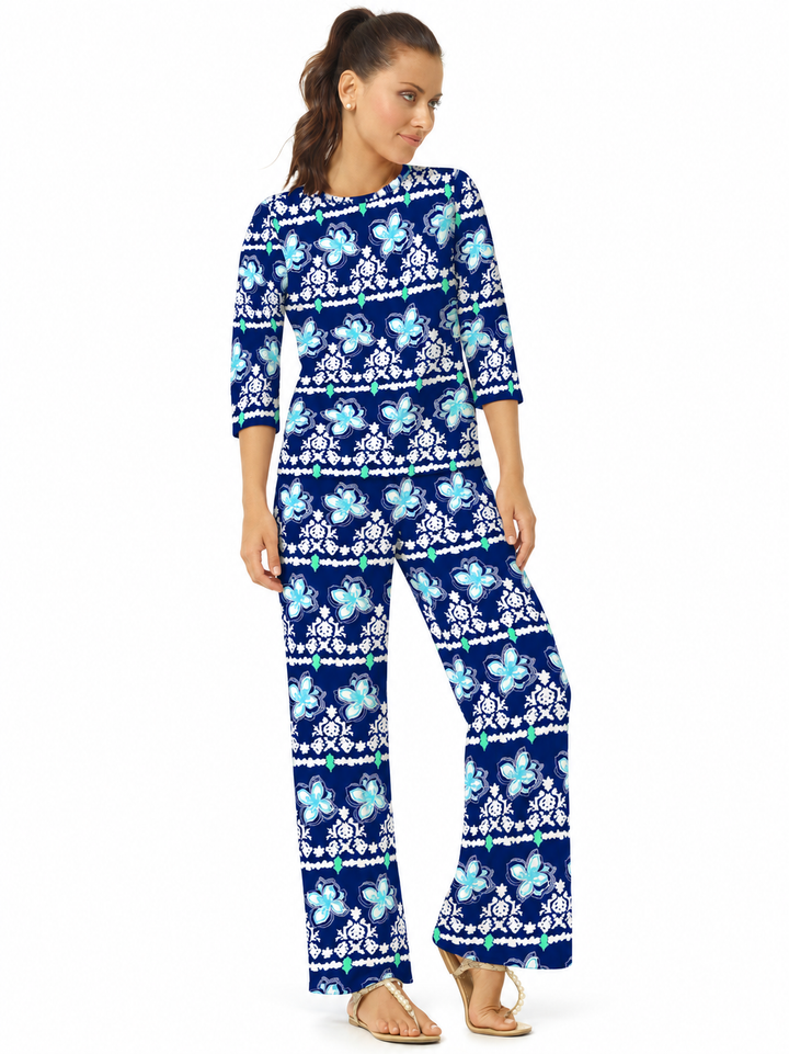Woman wearing the Navy Seafoam knit crew neck top and matching palazzo pants, 2 piece set