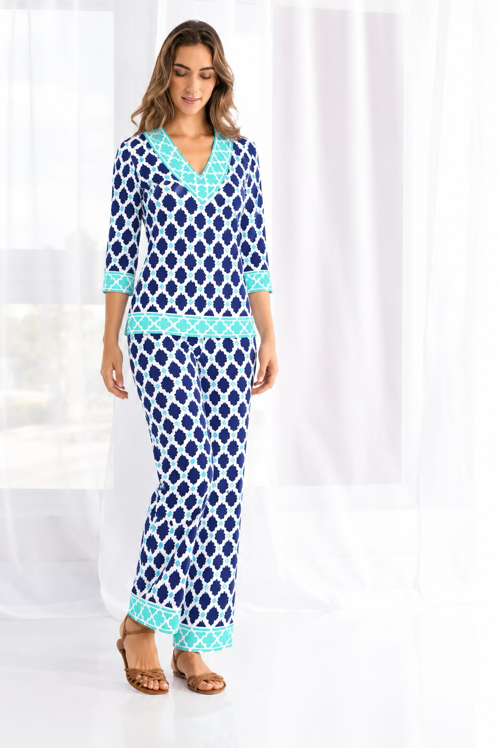Woman wearing the Navy Seafoam knit top and matching palazzo pants 2 piece set
